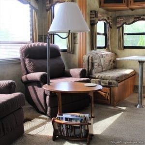 Wooden end table with lamp attatched, dark brown pole and new white shade