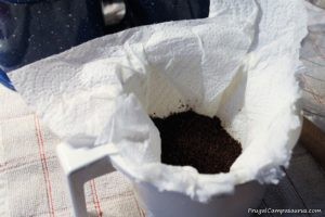 paper towel torn to be used as a coffee filter, works ok